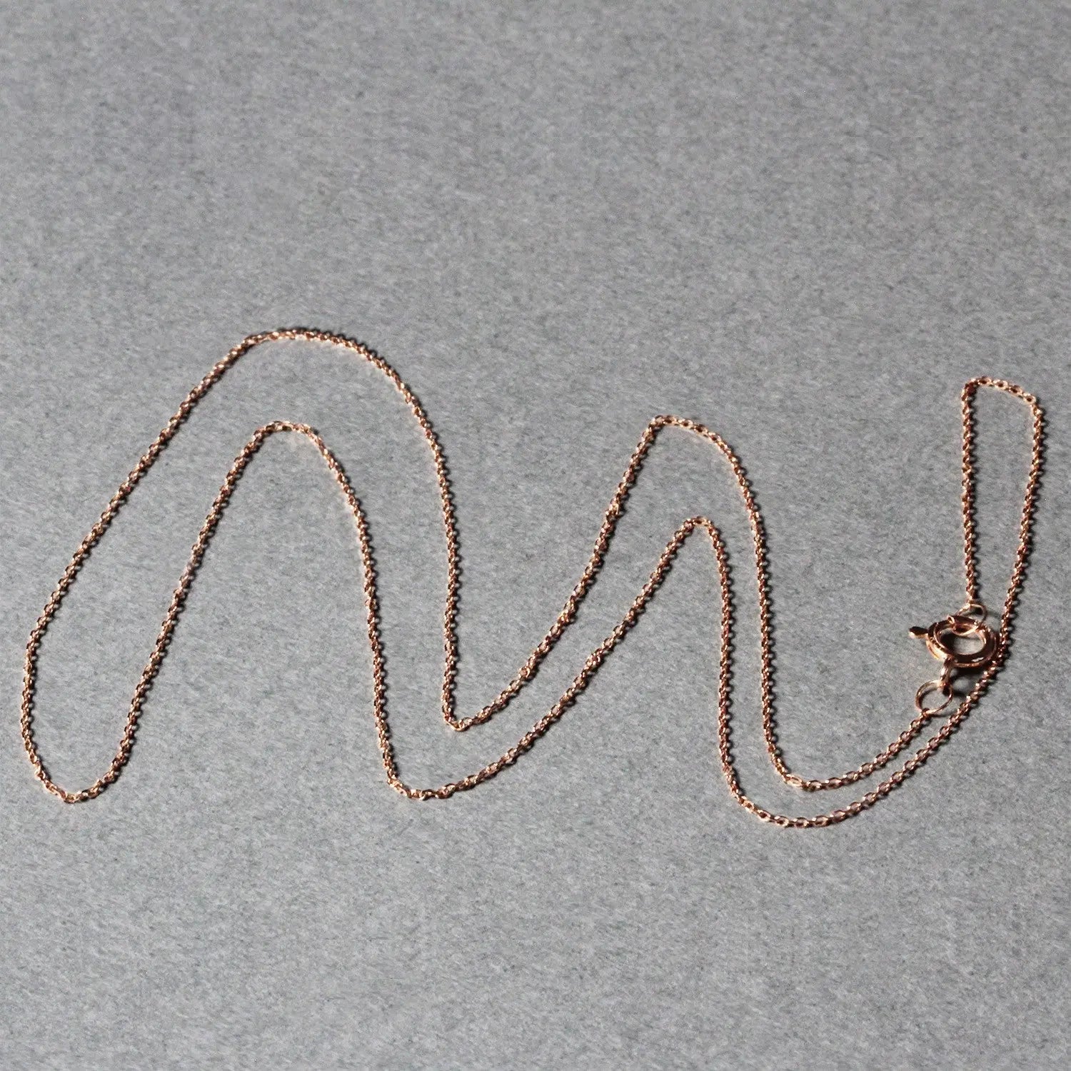 14k Rose Gold Diamond Cut Cable Link Chain (0.68 mm) RCJ Chains  CELESTIA LUXE JEWELLERS