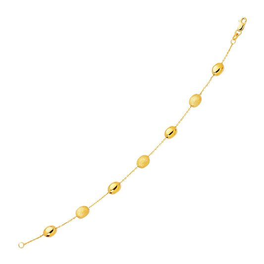 14k Yellow Gold Bracelet with Textured and Polished Pebble Stations (6.35 mm) RCJ Bracelets  CELESTIA LUXE JEWELLERS